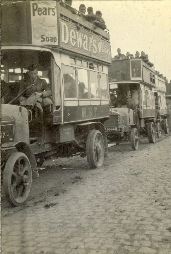 [Photograph, © South Lanarkshire Council Museums Service, from first album in Capt Rose collection  2008.142.052 - buses used for transport to and from Vlamertingh. The buses are recorded as being used in a subsequent move from Vlamertinghe to Levantie on 19 Oct 14]